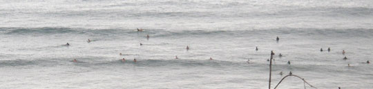 Hundreds of surfers flock to Diamond Head when the winds are calm